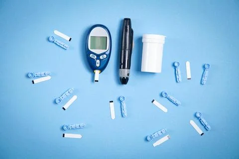 Glucometer with test strips and other objects. Devices for measuring of glu.. Stock Photos