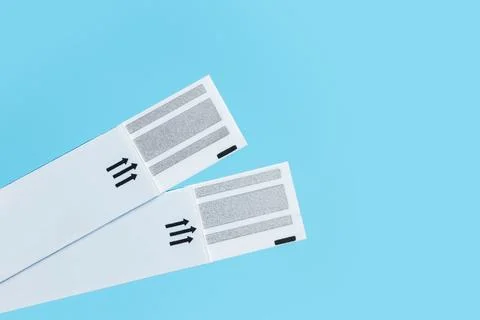 Glucometer test strips on a blue background Stock Photos