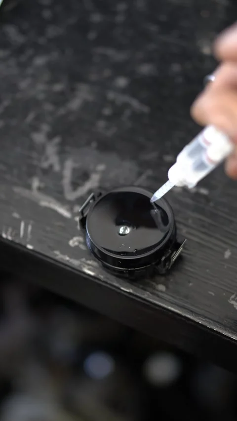 Glue drops from a syringe Stock Footage 314794058