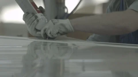 Glue on shiny surface. Truck assembly Stock Footage 33444471