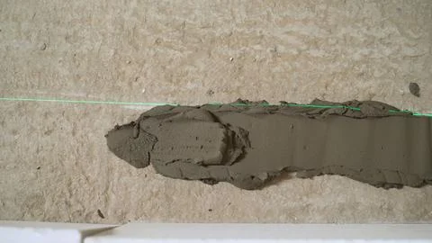 Glue - solution on the floor. Close-up of mortar on the floor for erecting a  Foto stock