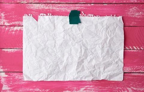Glued with adhesive tape rectangular empty white crumpled sheet of paper o... Stock Photos