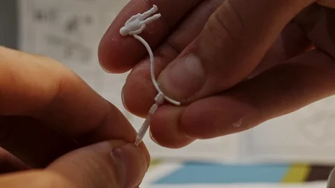 Glueing plastic pieces together, plastic model Stock Footage 112177432