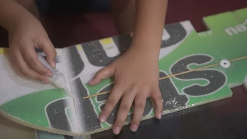 Gluing and assembling Stock Footage 308066855