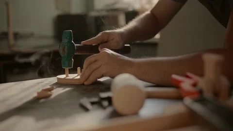 Gluing boards in a carpentry workshop. Connecting with dowels and glue. Producti Stock Footage 219347150