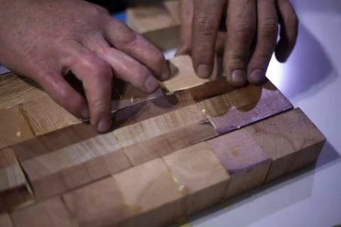 Gluing of different types of wood. Stock Photos