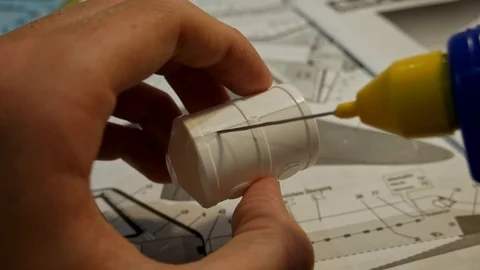 Gluing plastic model pieces together 스톡 동영상 112166762