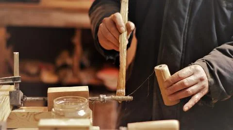 Gluing the tip to the handle of the clamp Stock Photos