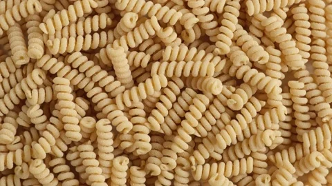 Gluten Free Cornmeal Pasta Wallpaper. Sp... | Stock Video | Pond5