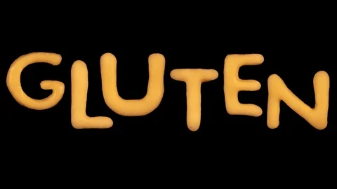 Gluten, text made from dough letters, baking time lapse, transparent background Stock Footage 105568000