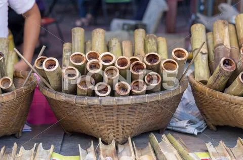 Glutinous rice roasted in bamboo joints Stock Photos