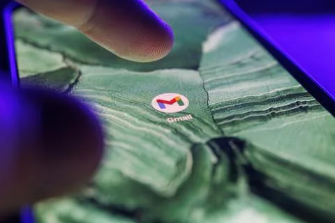 Gmail app on smartphone screen. Close up shot of google mail app Stock Photos