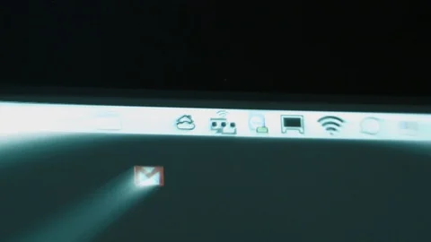 Gmail email notification in Apple Computers iMac top bar Stock Footage 99138409