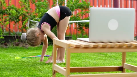 Gmnastics remotely online Stock Footage 130349613