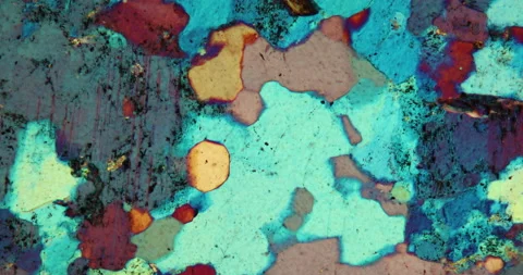Gneiss thin section of stone under the microscope Stock Footage 136450917