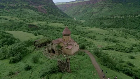 Gnevank Monastery in the deep green gorge of Lori Armenia. Drone video. Stock Footage 253413985