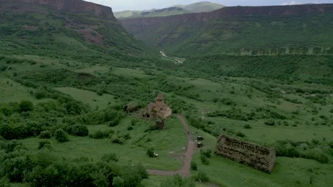 Gnevank Monastery in the deep green gorge of Lori Armenia. Drone video. Stock Footage 253430136