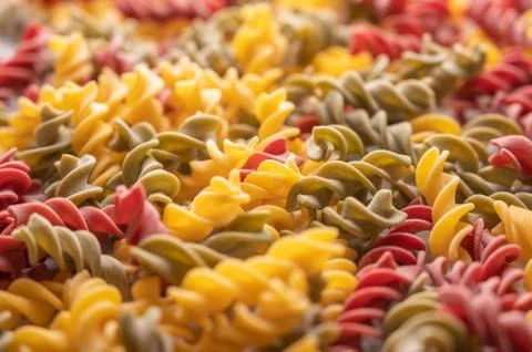 Gnocchetti multicolored pasta background concept. Diet and healthy food concept Stock Photos
