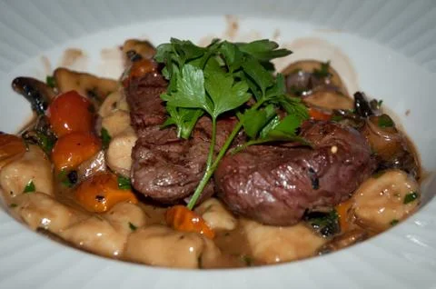 Gnocchi with beef and vegetables . Stock Photos