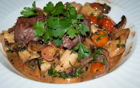 Gnocchi with beef and vegetables . Stock Photos