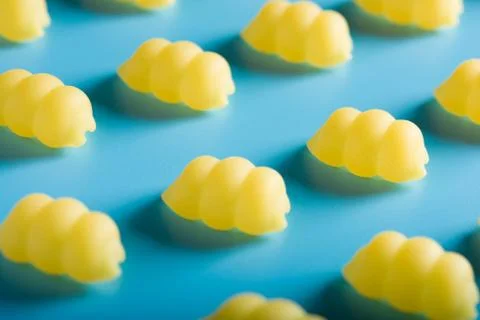 Gnocchi pasta pattern on a blue background Stock Photos