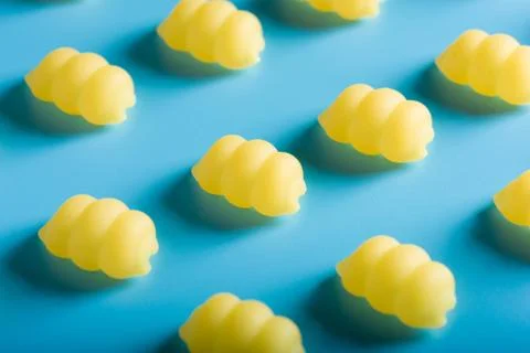 Gnocchi pasta pattern on a blue background Stock Photos
