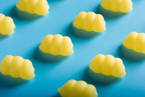 Gnocchi pasta pattern on a blue background Stock Photos