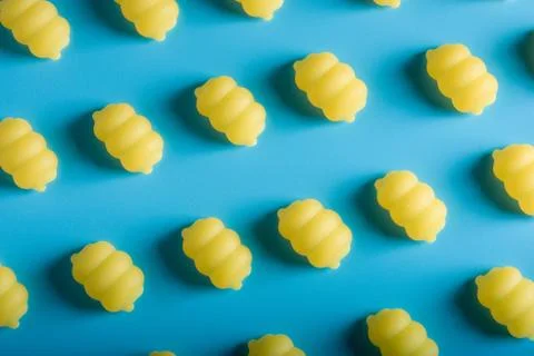 Gnocchi pasta pattern on a blue background Stock Photos