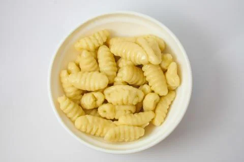 Gnocchi into the pot Stock Photos