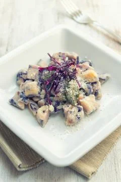 Gnocchi to the red cabbage Stock Photos