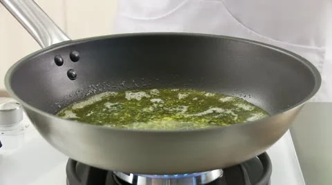 Gnocci being added to a pan of melted butter and sage Video stock 24644200