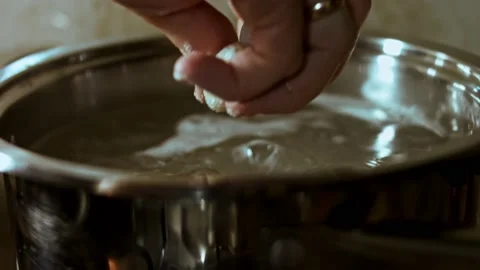 Gnocci being cooked in salt water, Pleasant atmosphere. 4k Video Stock Footage 144564105