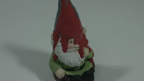 Gnome Statue Gets Soaked In Blood Red Paint 4K Stock Footage 218632891