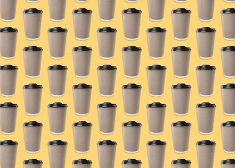 To-go drink. Pattern design with paper coffee cup on pale orange background Stock Photos