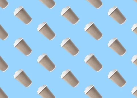 To-go drink. Pattern design with paper coffee cup on light blue Stock Photos