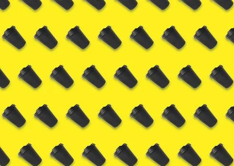 To-go drink. Pattern design with paper coffee cup on yellow background Stock Photos