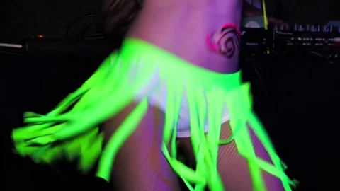 Go-Go Dancer in Green Neon Skirt Dancing in Night Club Stock Footage 72008191