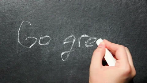 Go green - hand write text on blackboard, ecology and healthy lifestyle concept Stock Footage 94039506