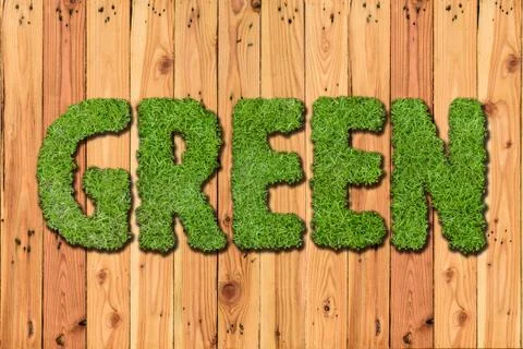 Go Green text on grass texture and wooden background for spring or summer and Stock Photos