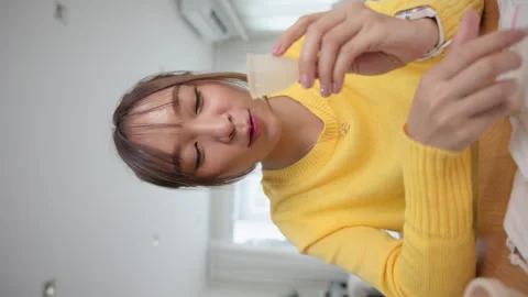 Go green zero waste reusable period cup live stream selfie talk on phone 스톡 동영상 281655682