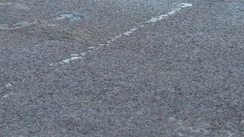 A go-kart speeding past old tire barriers on a track. Stock Footage 343228728