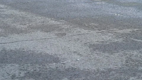 A go-kart speeding past old tire barriers on a track. Stock Footage 343228784