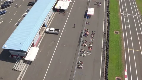 Go-karts Lined On The Racing Track Before Start Of The Race On A Sunny 動画素材 160543771