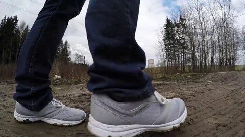 Go on a muddy road. Legs in the mud Video stock 74932443