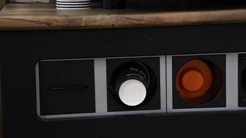 To Go paper coffee cup dispensor Stock Footage 230955980