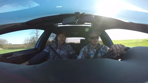Go pro films 2 guys in rally car driving Stock Footage 56566657