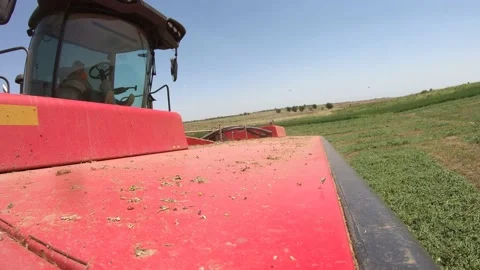 Go Pro - Header of a Swather Crossing a Ditch (1) Stock Footage 221862368