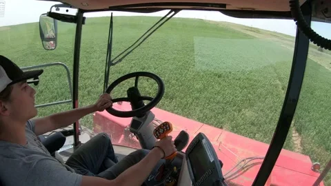 Go Pro - Inside Cab of a Swather (1) Stock Footage 221862490