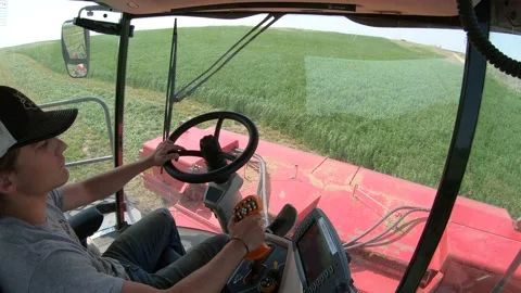 Go Pro - Inside Cab of a Swather Starting Stock Footage 221862494