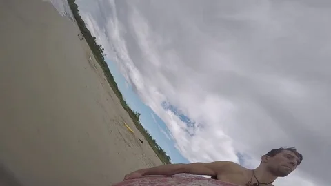 Go Pro Run Jump Onto Surfboard in the Ocean Stock Footage 85130863